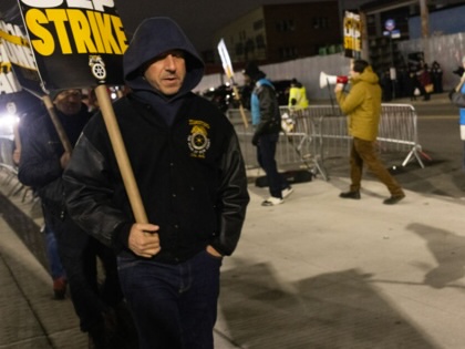 Amazon workers organized by the Teamsters union go on strike and walk a picket line in front of the DBK4 Amazon facility on December 20, 2024, in the Maspeth neighborhood in the Queens borough of New York City.