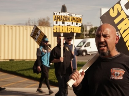 Amazon workers protest in front of an Amazon facility in the City of Industry, Los Angeles County, California, the United States, on Dec. 19, 2024. United Amazon workers from many warehouses in the United States have announced a strike beginning Thursday after they failed to reach an agreement on labor negotiations with the online retail giant. The International Brotherhood of Teamsters, the union representing 10,000 Amazon workers, said in an announcement on Wednesday night that the decision was made as the company refused to recognize their union and would not negotiate a fair contract. 