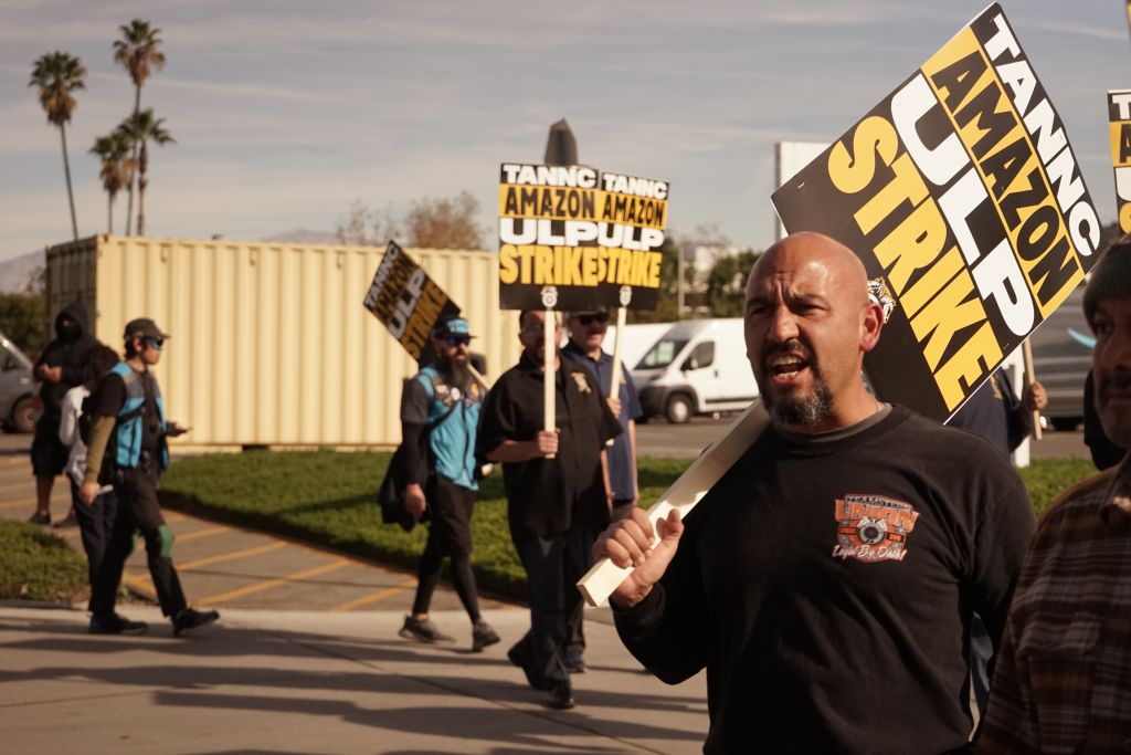 Amazon workers protest in front of an Amazon facility in the City of Industry, Los Angeles County, California, the United States, on Dec. 19, 2024. United Amazon workers from many warehouses in the United States have announced a strike beginning Thursday after they failed to reach an agreement on labor negotiations with the online retail giant. The International Brotherhood of Teamsters, the union representing 10,000 Amazon workers, said in an announcement on Wednesday night that the decision was made as the company refused to recognize their union and would not negotiate a fair contract. 