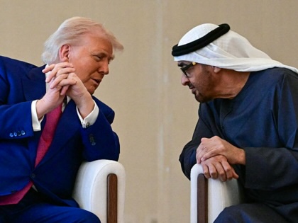 United Arab Emirates President Sheikh Mohamed bin Zayed Al Nahyan welcomes Donald Trump upon arrival at the presidential terminal in Abu Dhabi on May 15, 2025.