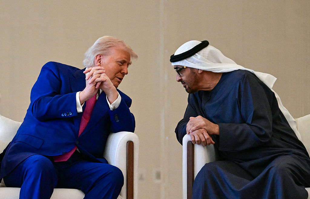 United Arab Emirates President Sheikh Mohamed bin Zayed Al Nahyan welcomes Donald Trump upon arrival at the presidential terminal in Abu Dhabi on May 15, 2025.