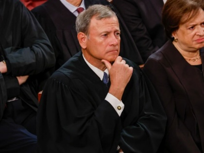 Justices John Roberts and Elena Kagan listen as Joe Biden delivers his State of the Union address during a joint meeting of Congress in the US Capitol on February 7, 2023.