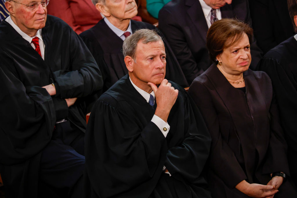 Justices John Roberts and Elena Kagan listen as Joe Biden delivers his State of the Union address during a joint meeting of Congress in the US Capitol on February 7, 2023.