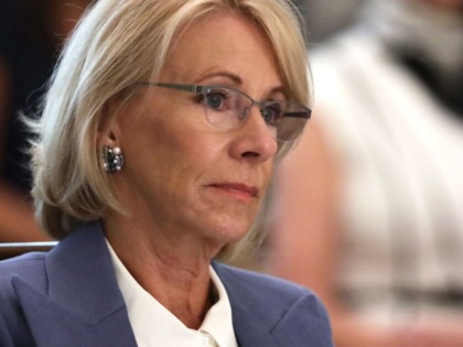 Former Secretary of Education Betsy DeVos listens during a cabinet meeting in the East Room of the White House on May 19, 2020, in Washington, DC.