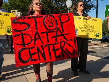 Sue Ellen Davis of Angleton protests data center expansion at a rally at the Capitol before a Texas Senate Committee on Finance hearing in Austin, Monday, July 27, 2026.