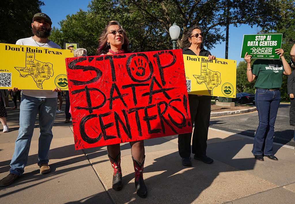 Sue Ellen Davis of Angleton protests data center expansion at a rally at the Capitol before a Texas Senate Committee on Finance hearing in Austin, Monday, July 27, 2026.