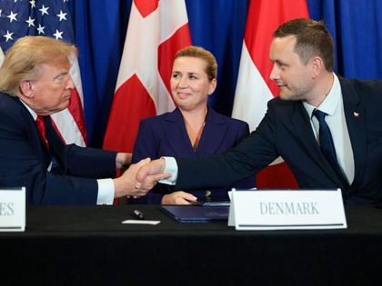 US President Donald Trump, Prime Minister of Denmark Mette Frederiksen, and Prime Minister of Greenland Jens-Frederik Nielsen shake hands during the signing of a security pact between the US, Denmark, and Greenland during the 81st session of the United Nations General Assembly at UN Headquarters on September 22, 2026, in New York City.