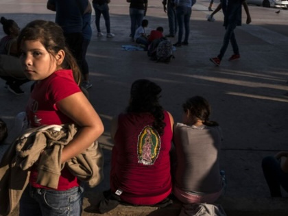Asylum seekers gather at El Chaparral port of entry in Tijuana, Mexico, on August 10, 2018.